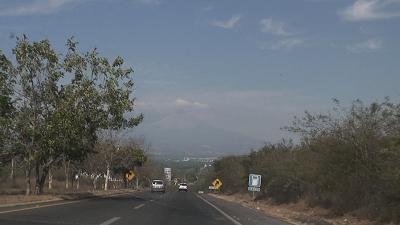 Colima City with Volcano in baccground haze