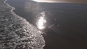 sun glinting on beach at Tenacatita